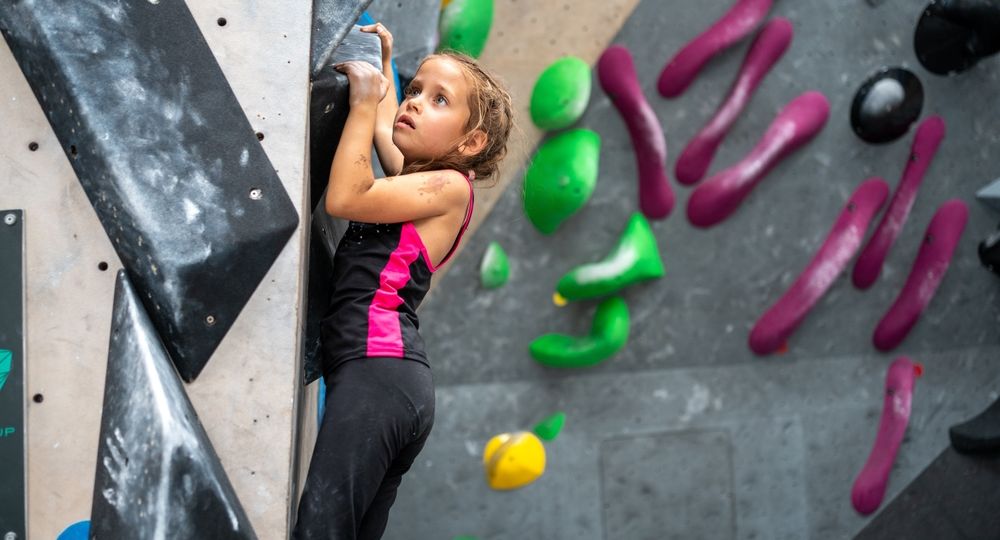 Side,View,Of,Determined,Girl,Climbing,Artificial,Wall.,Brave,And