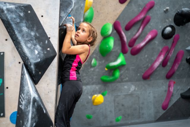 Side,View,Of,Determined,Girl,Climbing,Artificial,Wall.,Brave,And