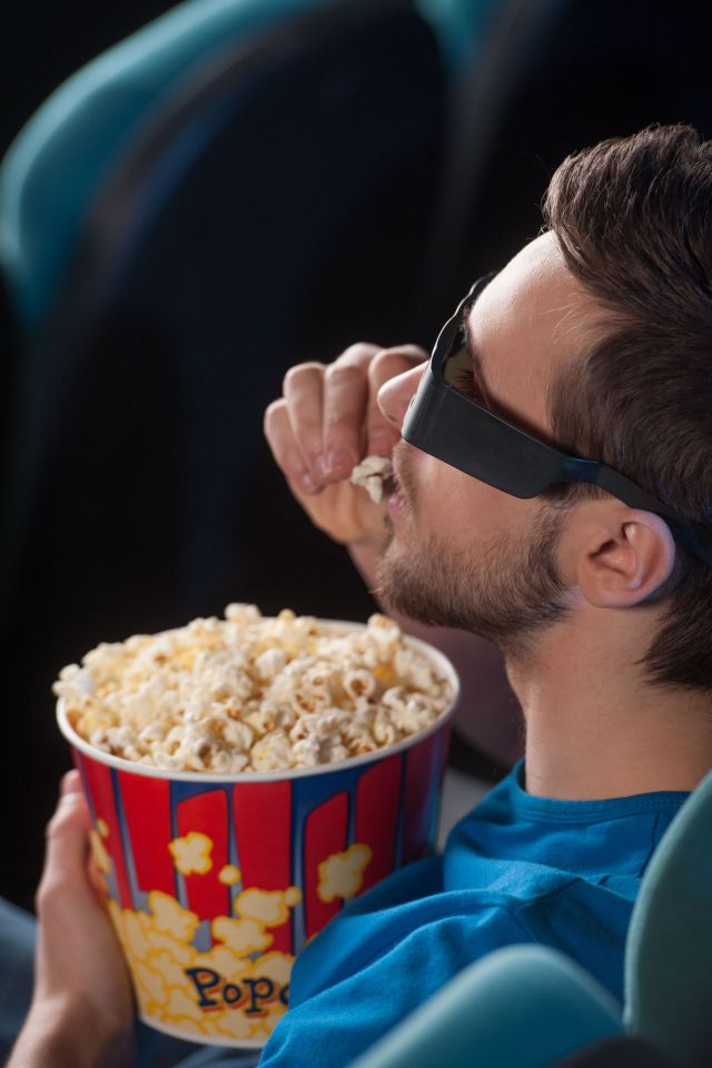 Men,At,Cinema.,Top,View,Of,Excited,Young,Men,In